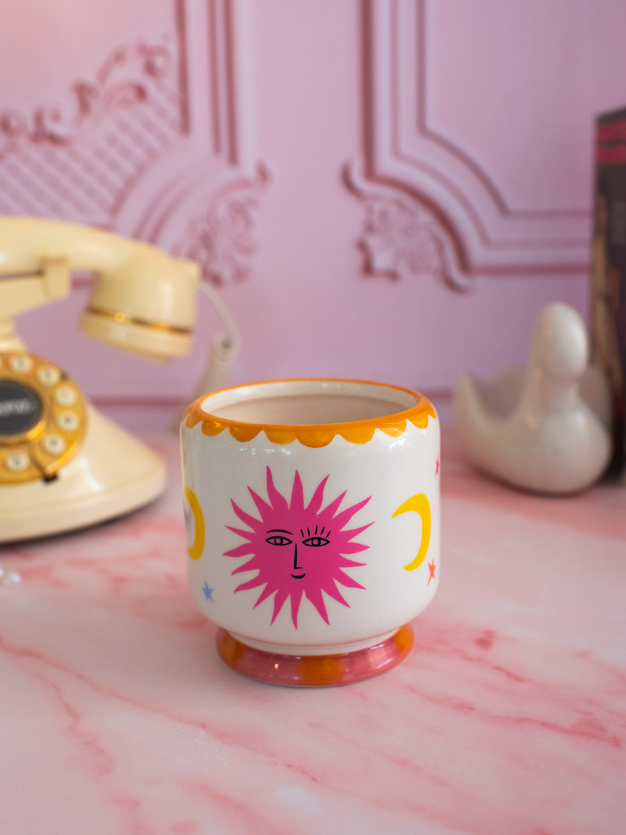 A Dopo 8 oz Handpainted Sun Ceramic Candle-  Orange Blossom