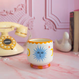 A Dopo 8 oz Handpainted Sun Ceramic Candle-  Orange Blossom