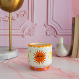 A Dopo 8 oz Handpainted Sun Ceramic Candle-  Orange Blossom