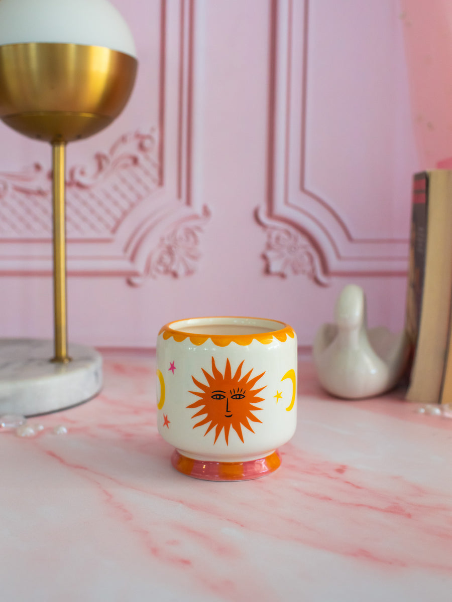 A Dopo 8 oz Handpainted Sun Ceramic Candle-  Orange Blossom