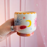 A Dopo 8 oz Handpainted Sun Ceramic Candle-  Orange Blossom