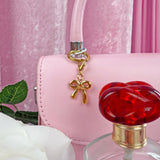 Gold Bow Clip On Charm
